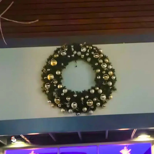 Decorative wreath with gold and silver ornaments
