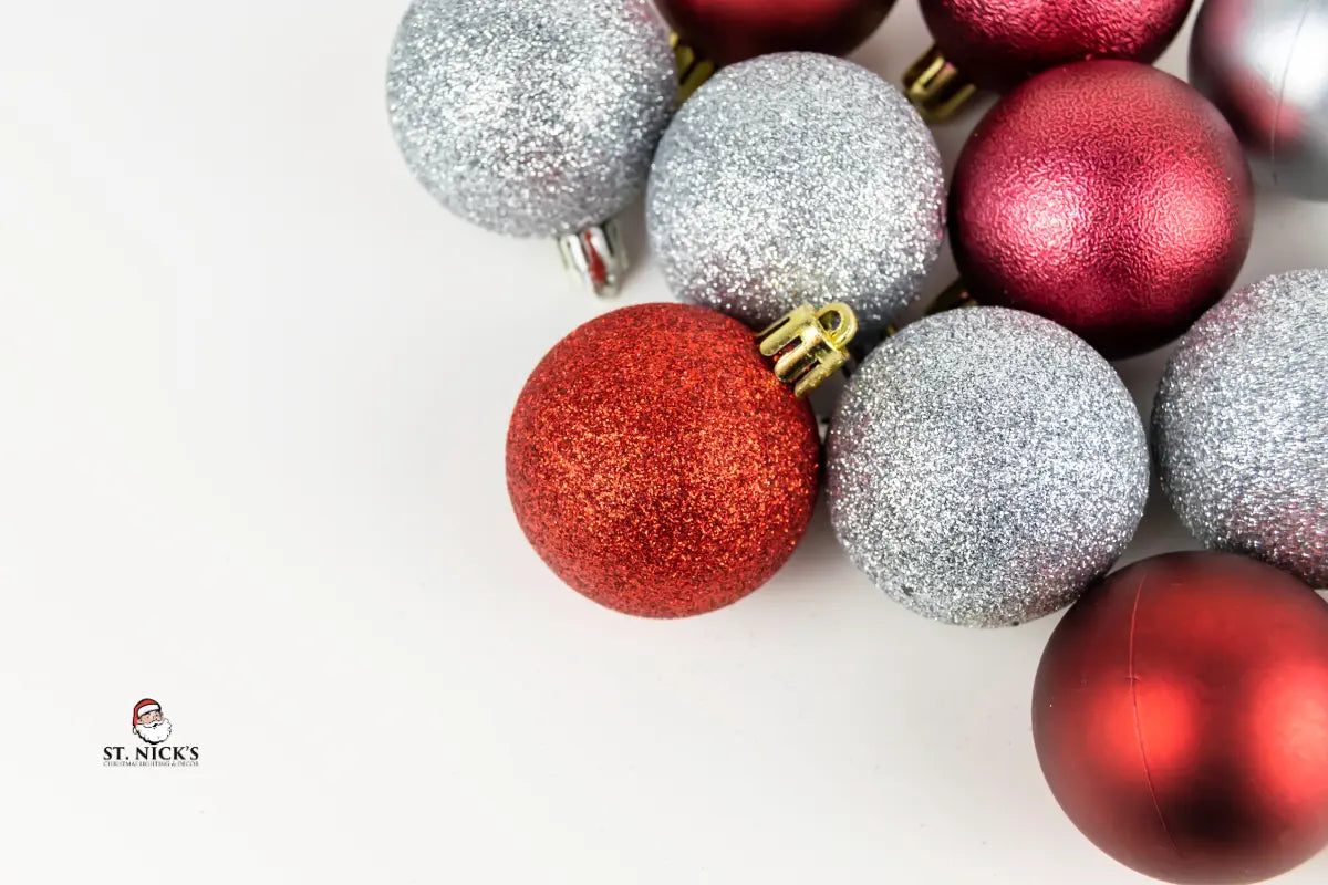 Decorative Christmas balls in red, silver, and pink