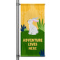 Adventure Lives Here yellow street pole banner featuring white rabbit illustration in nature scene