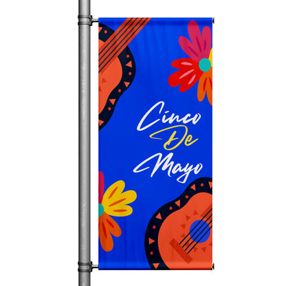 Cinco de Mayo pole banner with blue background, colorful guitar and floral artwork, and festive handwritten lettering