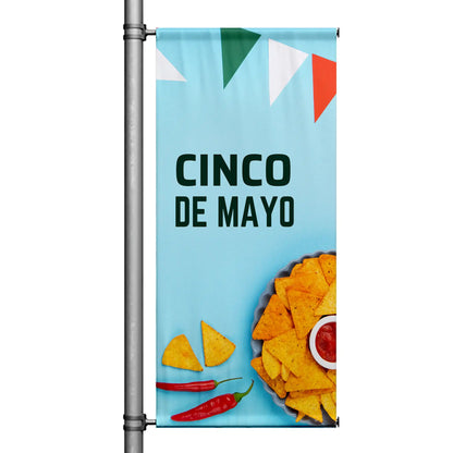 Cinco de Mayo pole banner with tortilla chips, salsa, chili peppers, and festive pennant design on light blue background