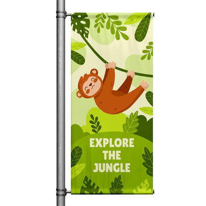 Explore the Jungle green street pole banner featuring playful monkey illustration hanging from vine