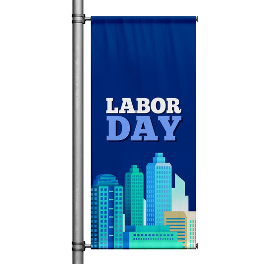Labor Day pole banner with deep blue background, modern city skyline illustration, and bold “Labor Day” text