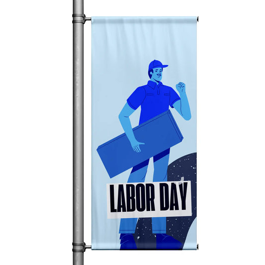 Labor Day pole banner with light blue background featuring illustrated worker carrying materials and bold “Labor Day” message