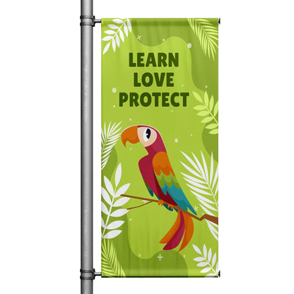 Learn Love Protect green street pole banner featuring colorful parrot and tropical foliage