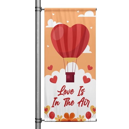 Love Is In The Air Valentine pole banner featuring heart-shaped hot air balloon design