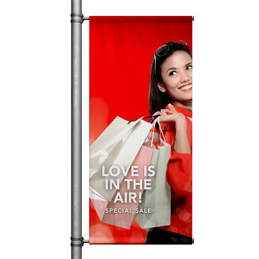 Love Is in the Air Valentine’s Day sale pole banner featuring woman shopping with bags on red background