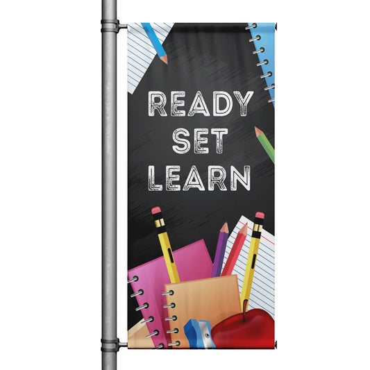 Ready Set Learn school pole banner with chalkboard-style background, pencils, notebooks, apple, and back-to-school classroom design