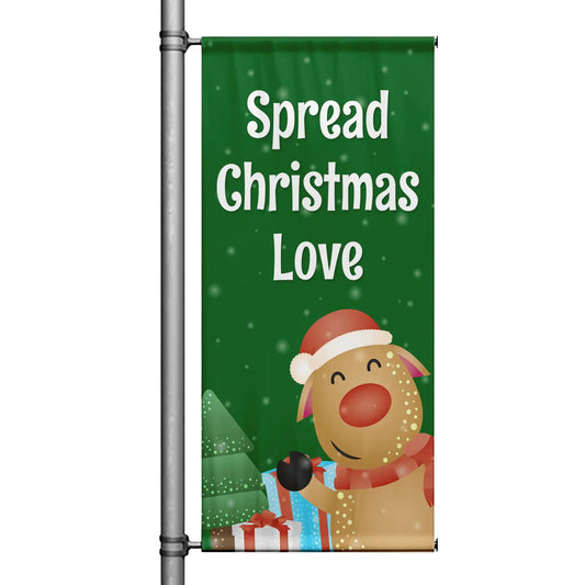 Spread Christmas Love Christmas pole banner with green background, cheerful reindeer illustration, falling snow, and festive holiday design