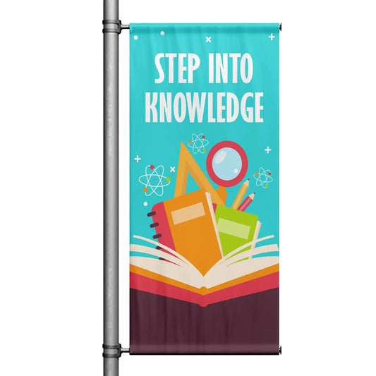 Step Into Knowledge school pole banner with teal background, open book illustration, school supplies, and educational theme