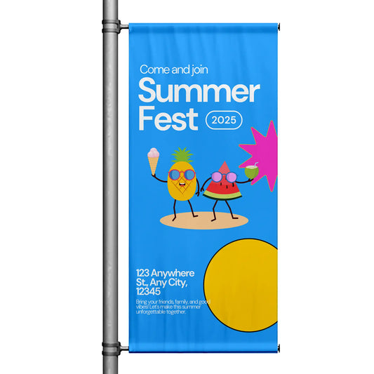 Summer Fest 2025 blue street pole banner featuring playful fruit characters and event graphics