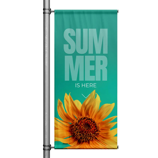 Summer Is Here green street pole banner featuring sunflower artwork for outdoor display