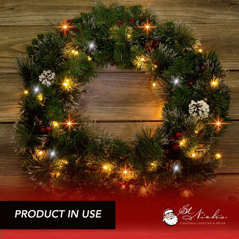 Amber, warm white, and cool white twinkle LED mini lights illuminating a decorated Christmas wreath on a rustic wood background