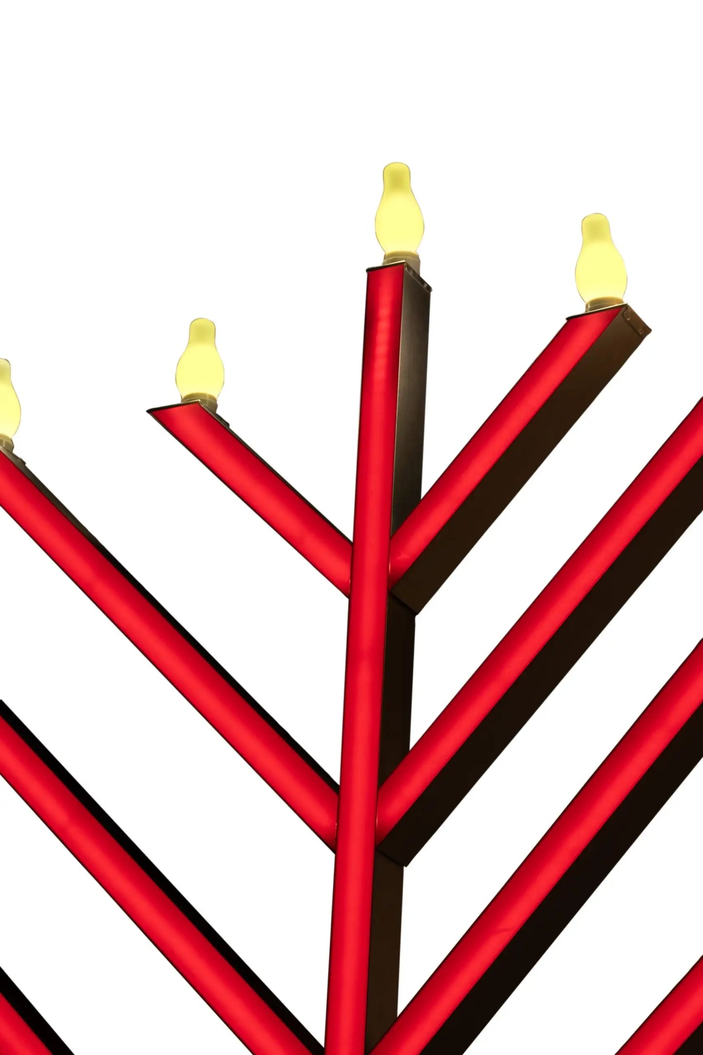 Red and black Menorah with lit candles 