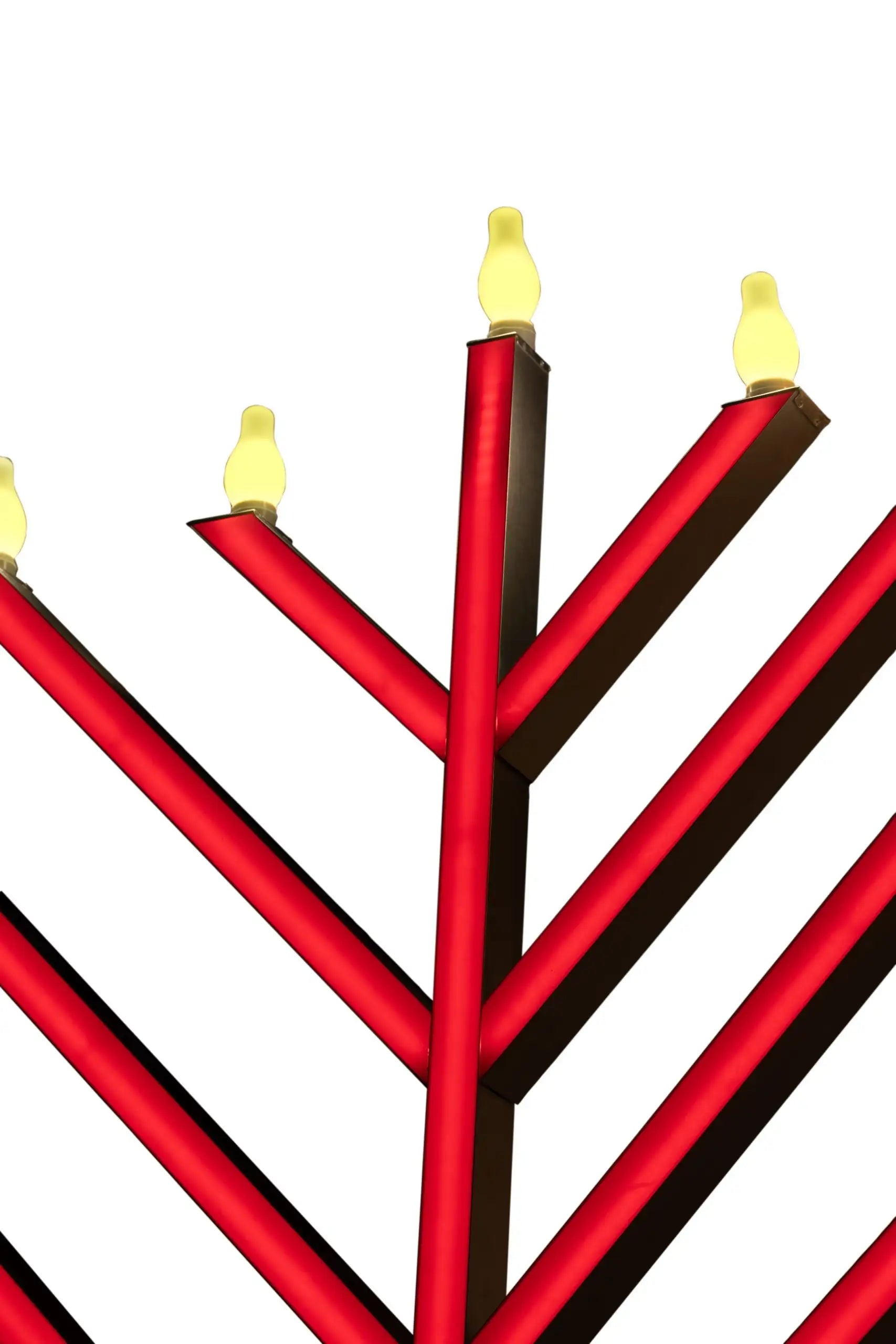 Red and black Menorah with lit candles 