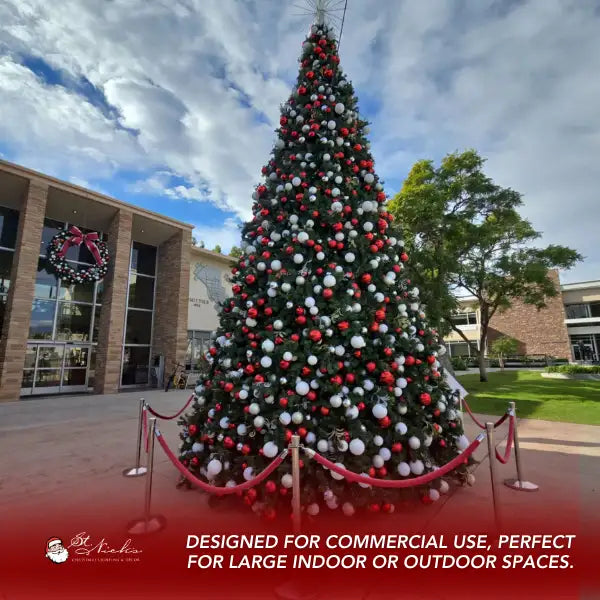 Decorative Christmas tree with red, white & silver ornaments storefront 