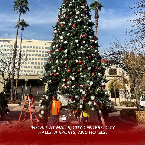 Decorated Christmas tree with red, white, and silver ornaments outdoor commercial settings