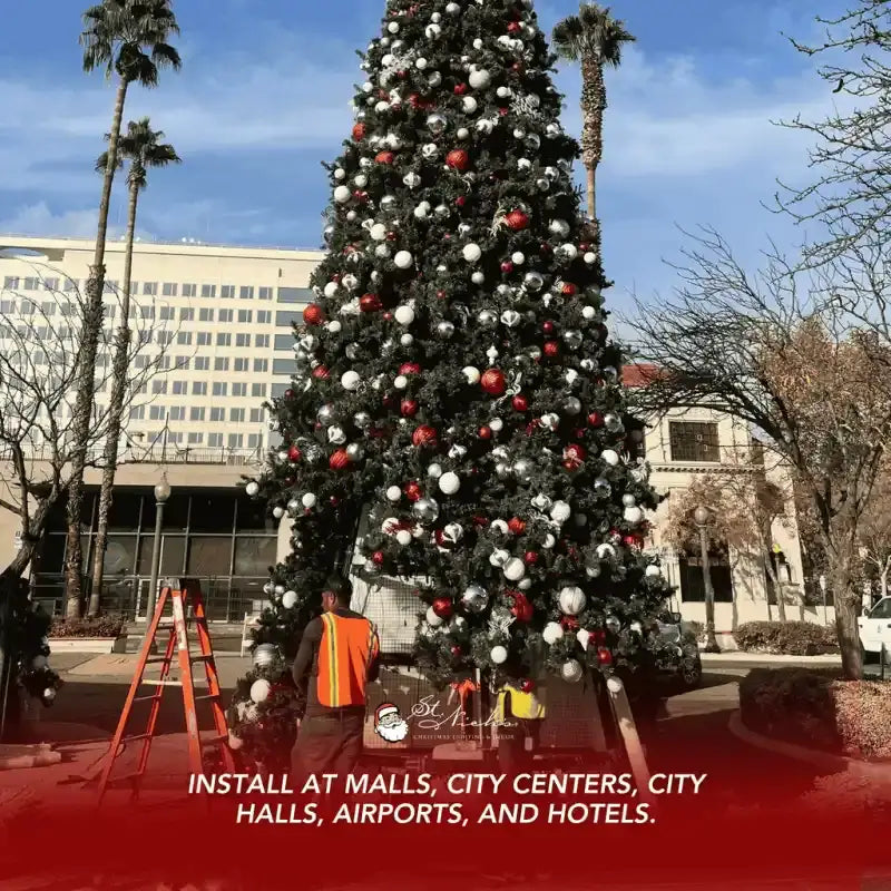 Decorated Christmas tree with red, white, and gold ornaments 
