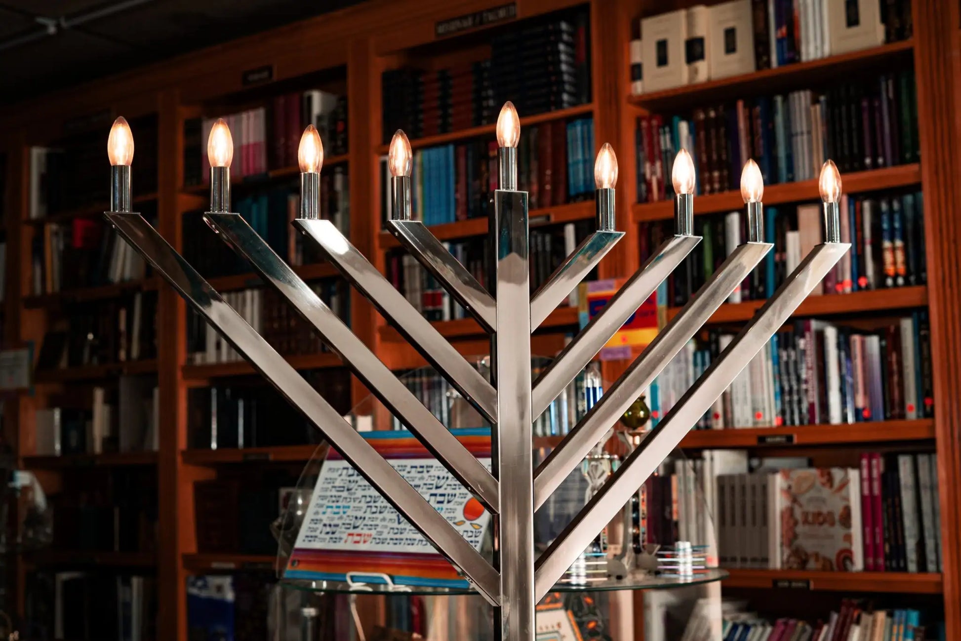 Menorah with lit candles i