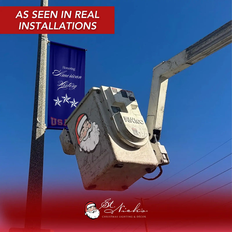 America 250 Honoring American History street pole banner installed using bucket truck during commercial installation