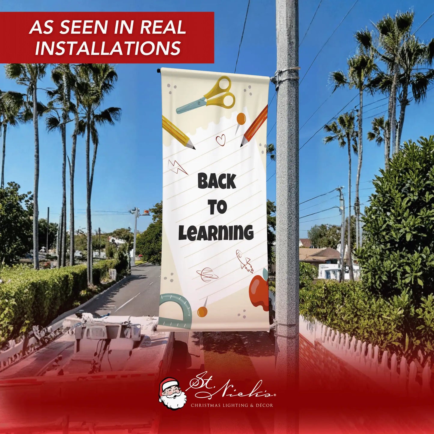 Back to Learning school pole banner displayed on street pole in real installation