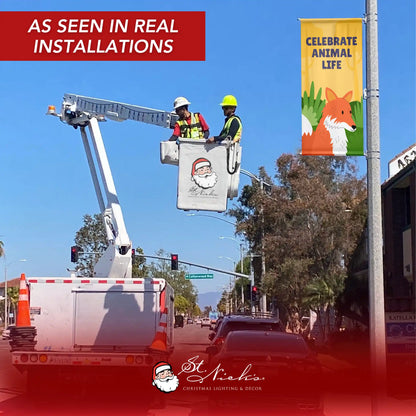 Celebrate Animal Life yellow street banner installed on light pole in outdoor setting