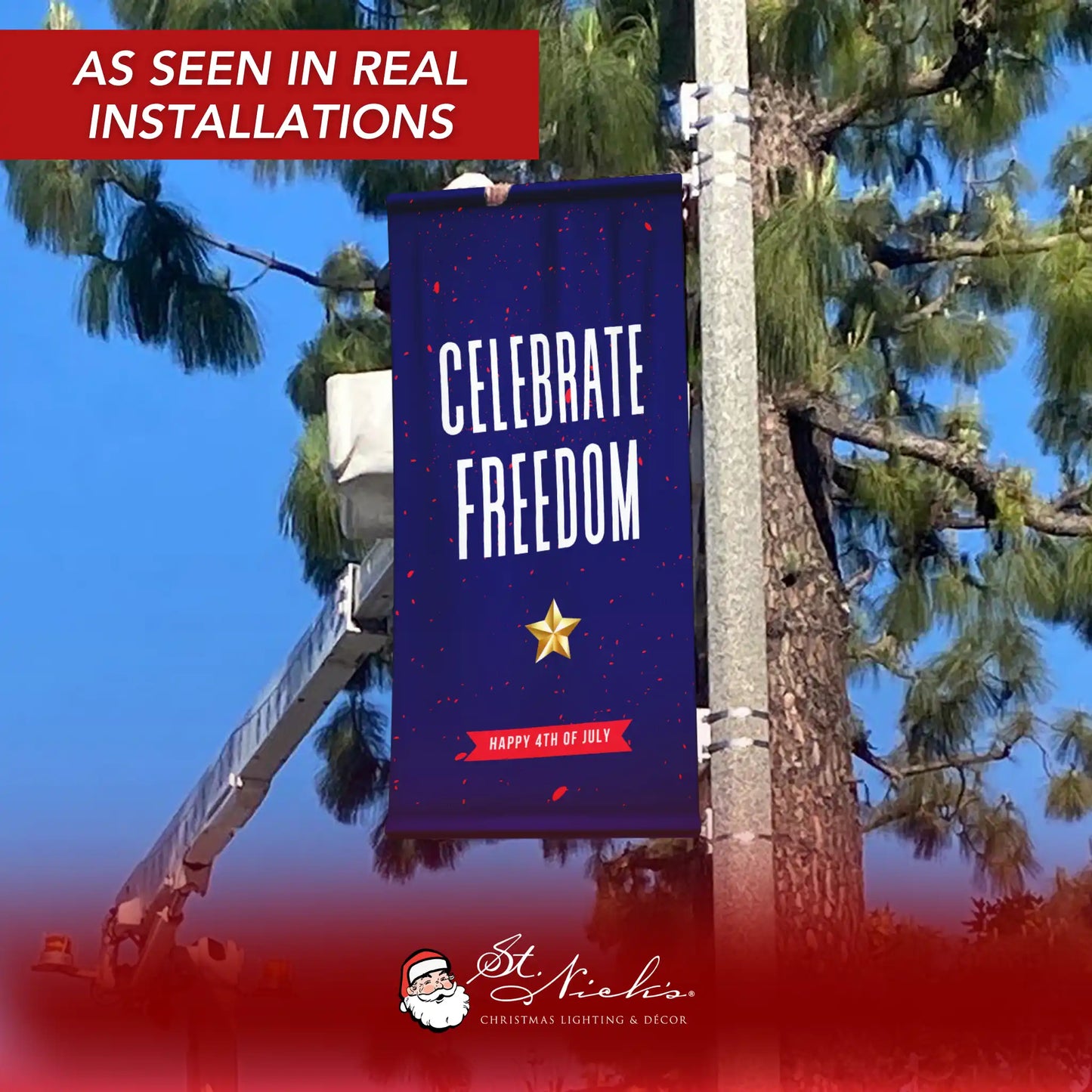 Celebrate Freedom 4th of July pole banner displayed on street pole in real installation