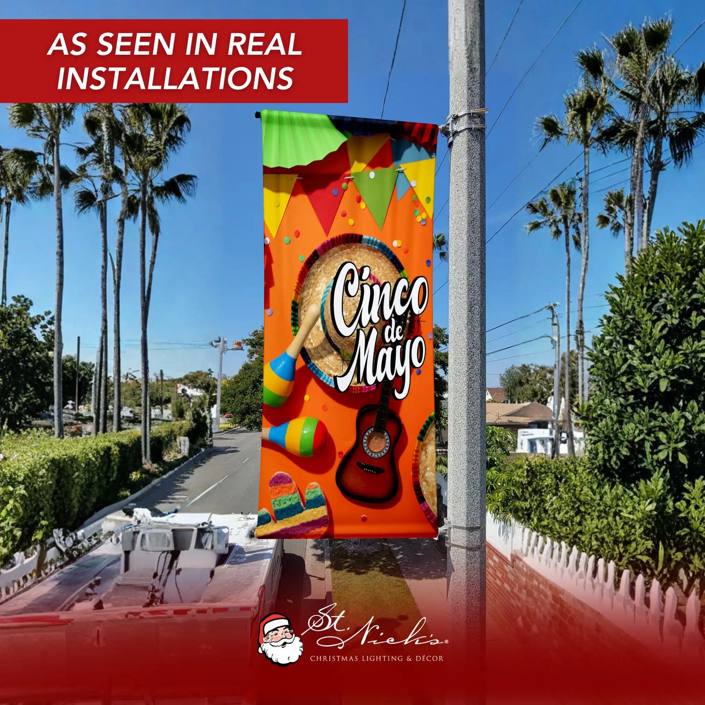 Cinco de Mayo fiesta instruments pole banner displayed on street pole in real installation