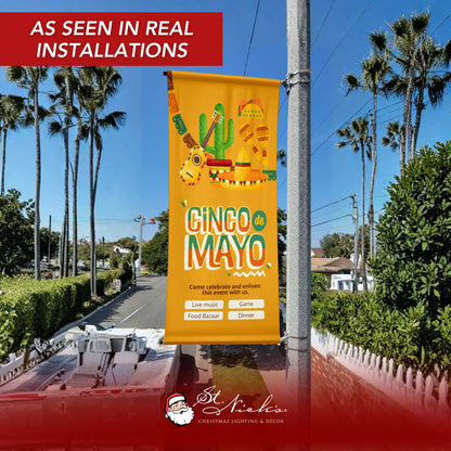 Cinco de Mayo illustrated guitar and cactus pole banner displayed on street pole in real installation