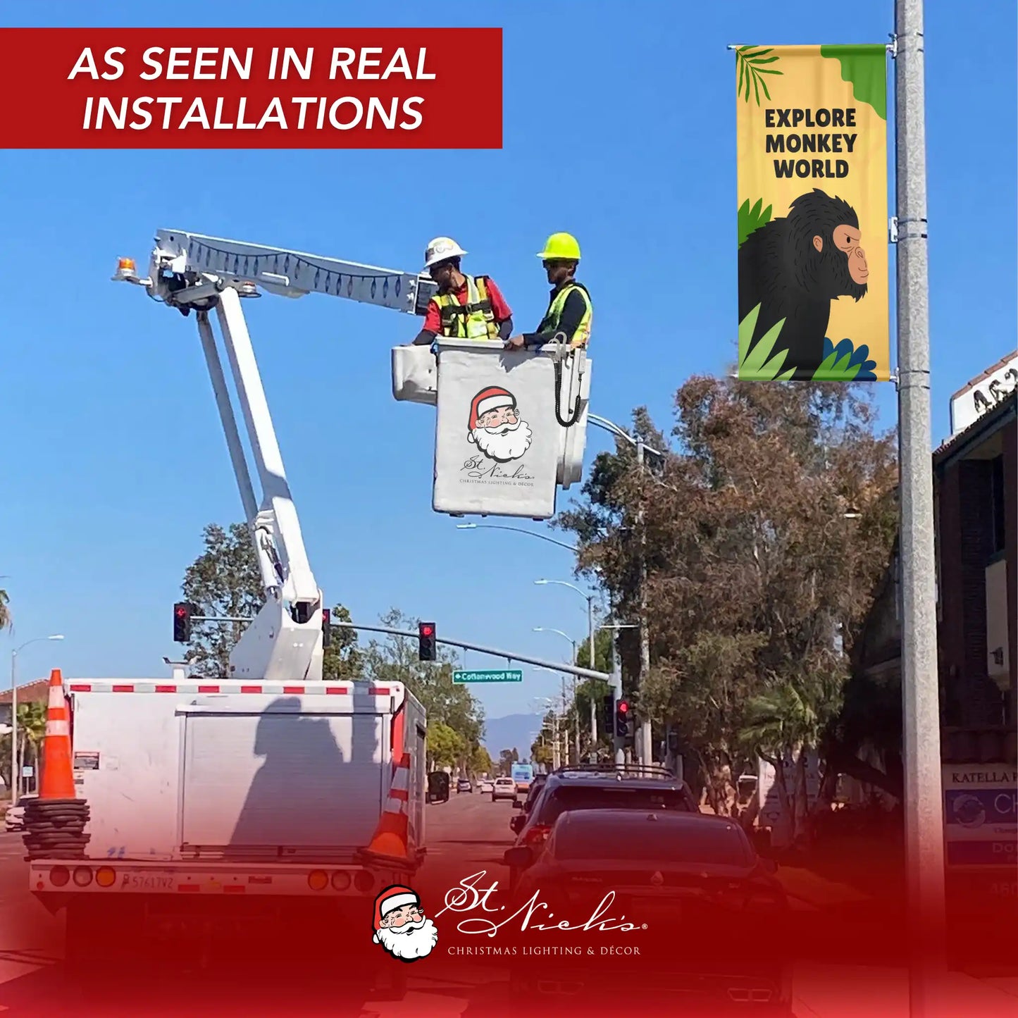 Explore Monkey World yellow street banner installed on light pole in outdoor setting