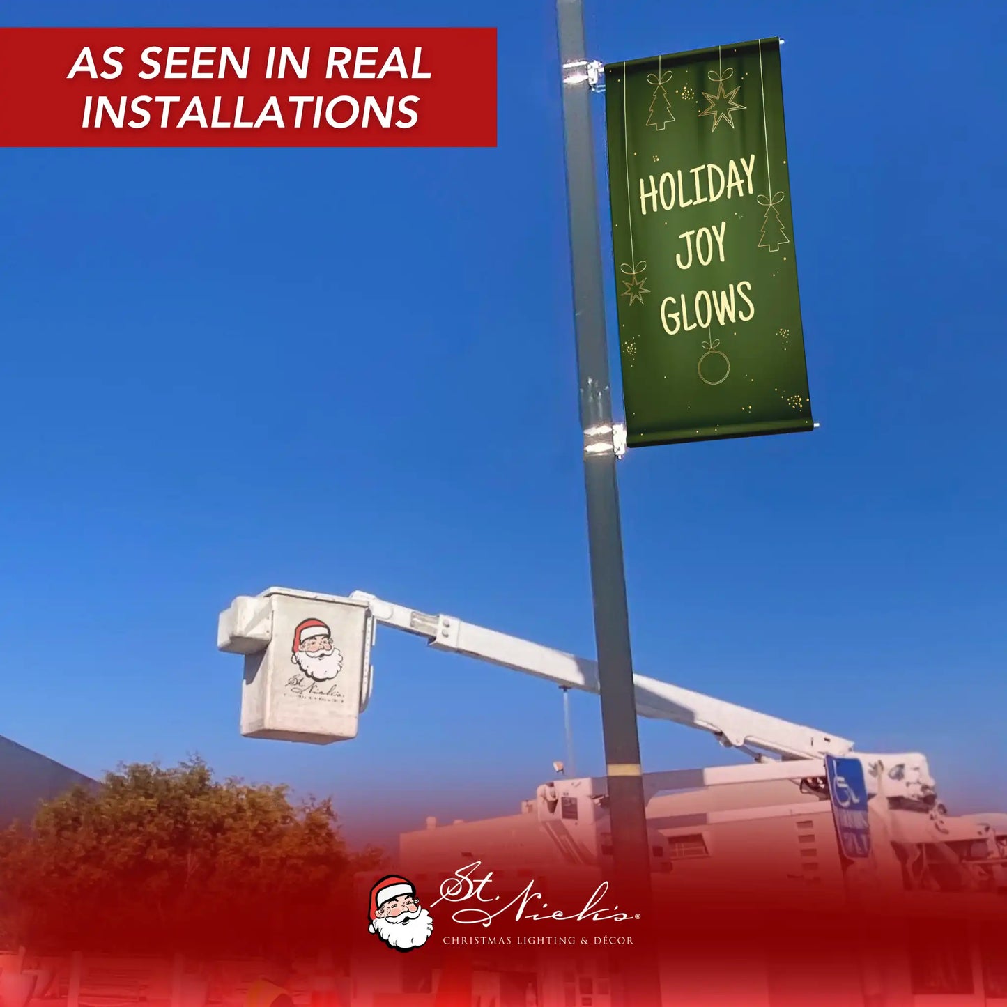 Holiday Joy Glows Christmas pole banner displayed on street pole in real installation