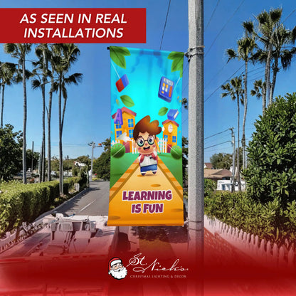 Learning Is Fun school pole banner displayed on street pole in real installation