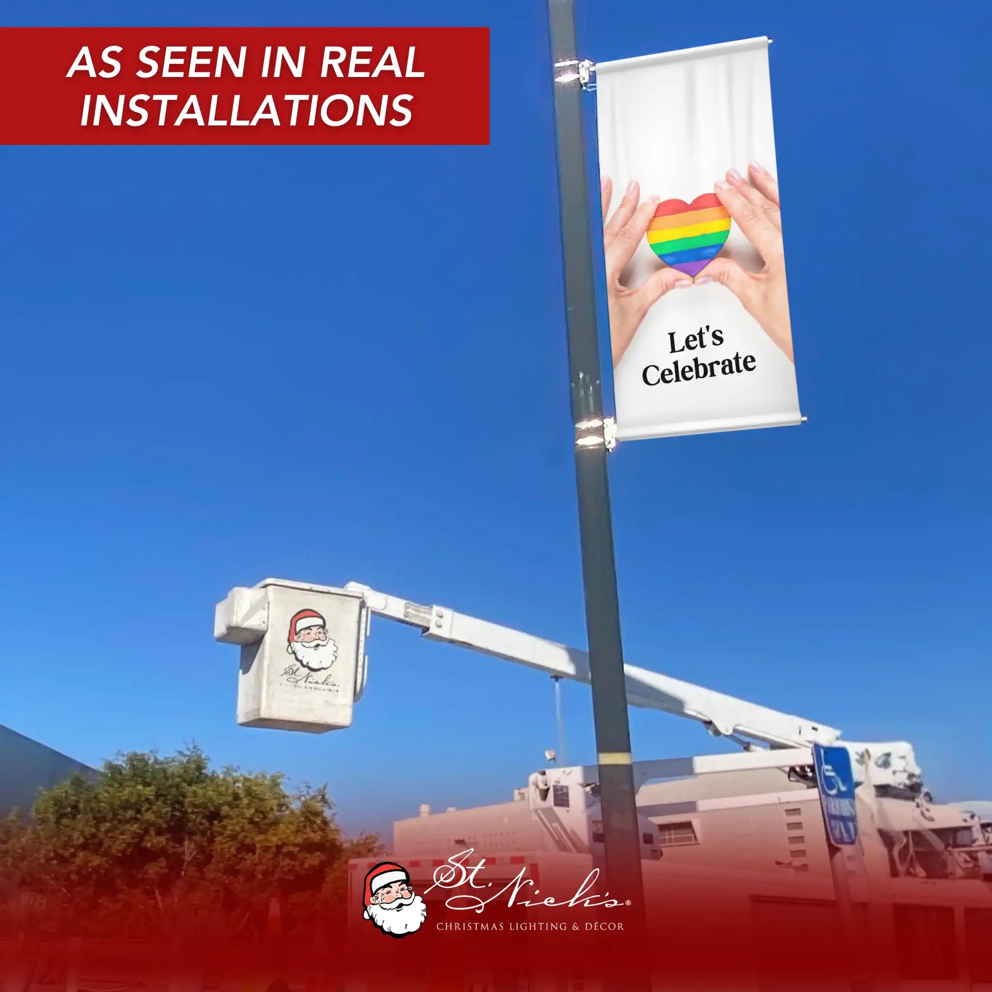 Let’s Celebrate pride pole banner displayed on street pole in real installation setting