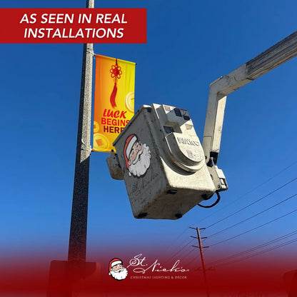 Luck Begins Here Lunar New Year pole banner installed on street pole in real-world commercial setting