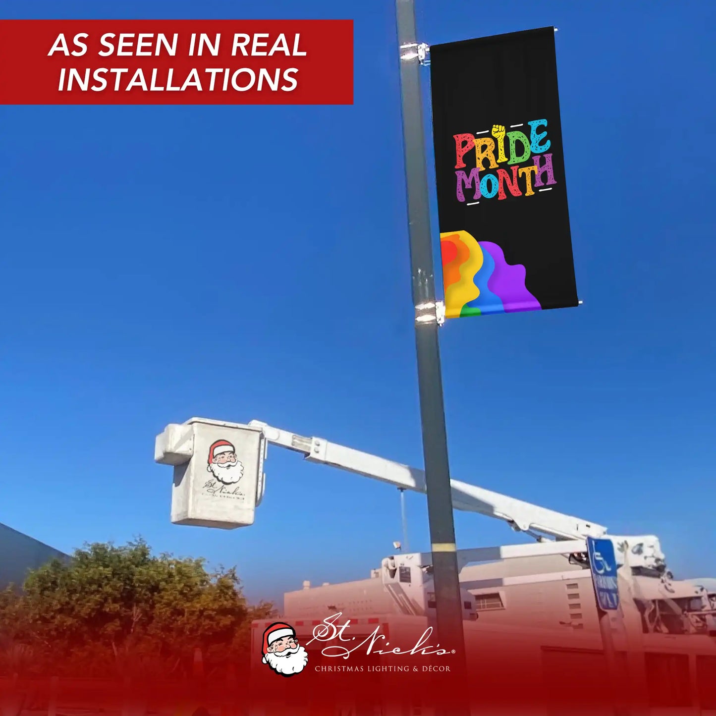 Pride Month black rainbow pride pole banner displayed on city street pole in real installation