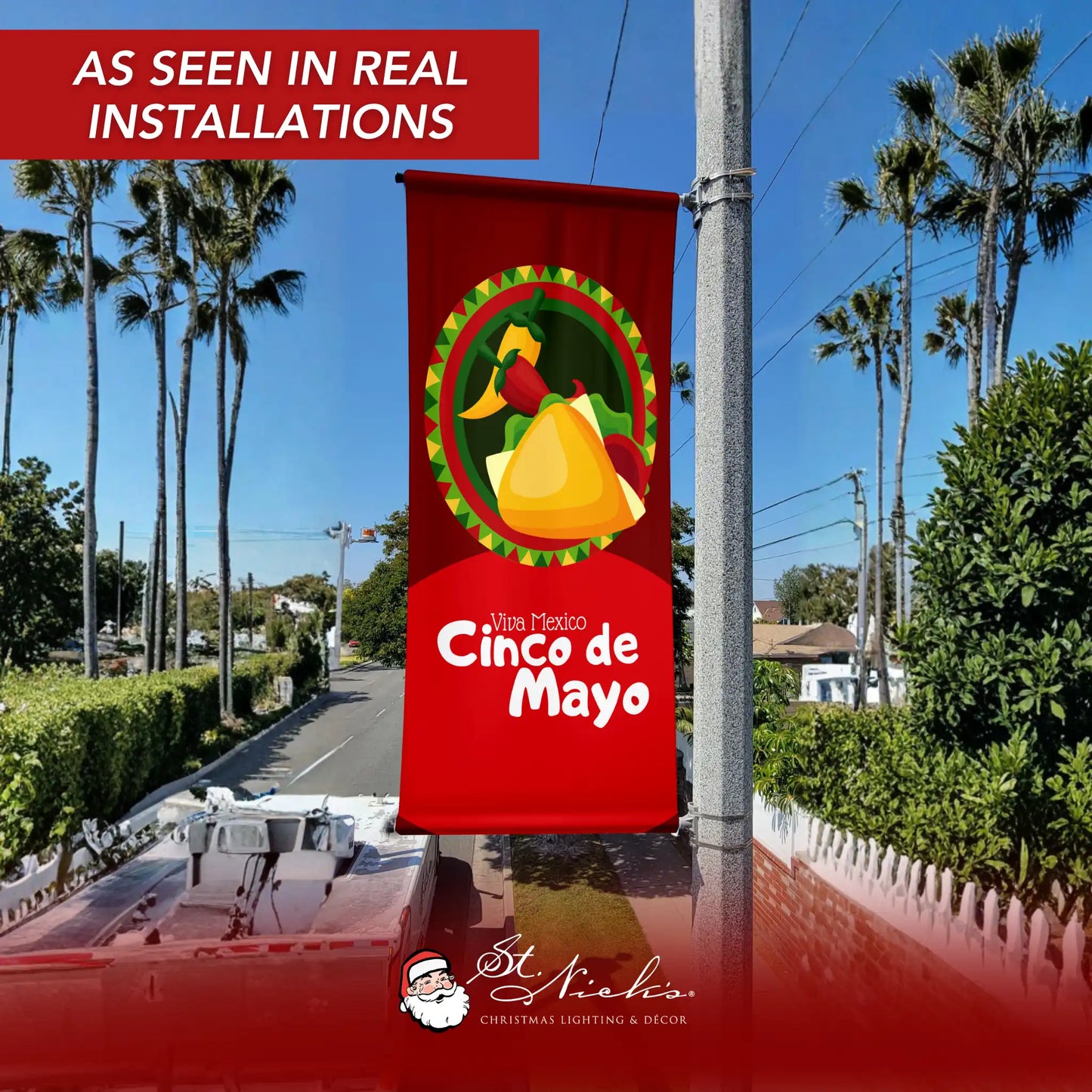 Viva Mexico Cinco de Mayo pole banner displayed on city street pole in real installation