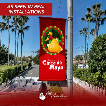 Viva Mexico Cinco de Mayo pole banner displayed on city street pole in real installation