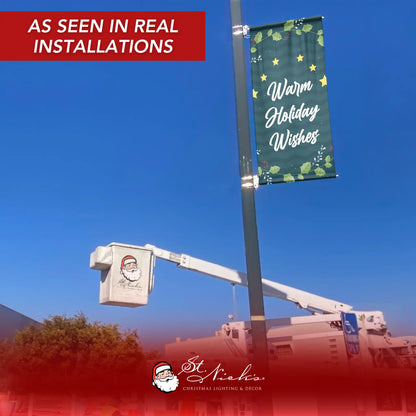 Warm Holiday Wishes Christmas pole banner displayed on street pole in real installation