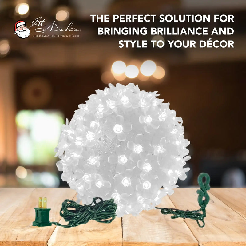 White blossom sphere decorative light displayed on table for holiday decor styling