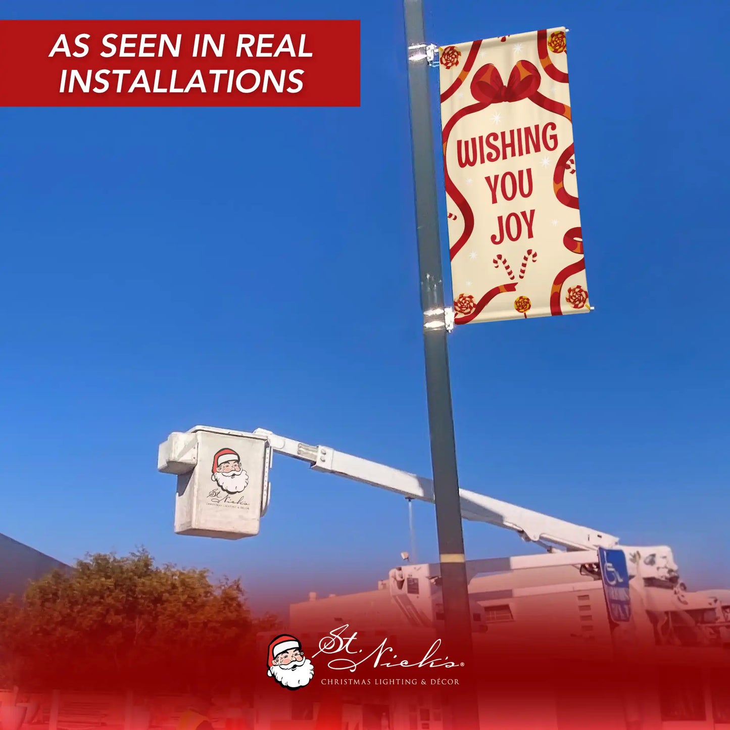 Wishing You Joy holiday pole banner displayed on street pole in real installation