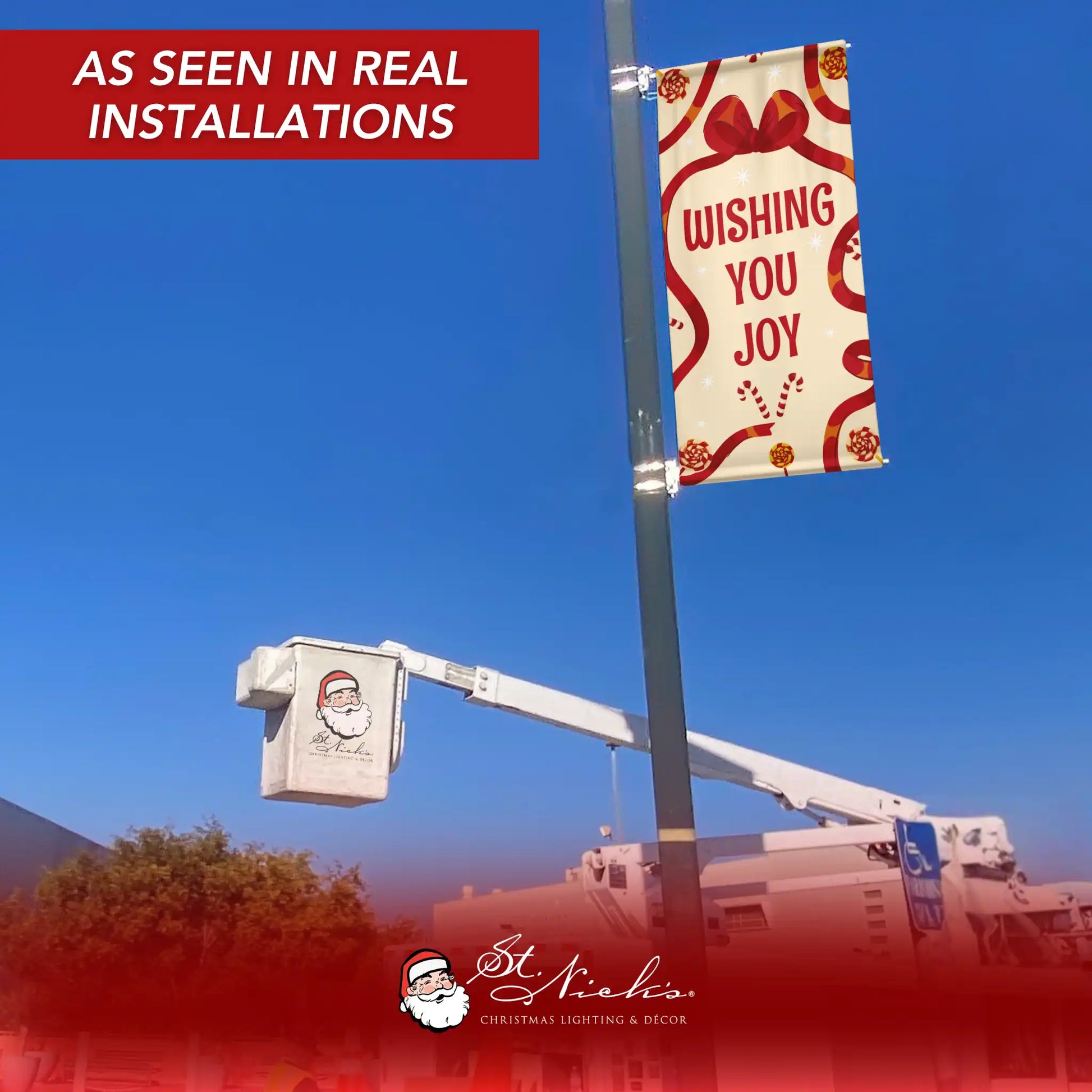 Wishing You Joy holiday pole banner displayed on street pole in real installation