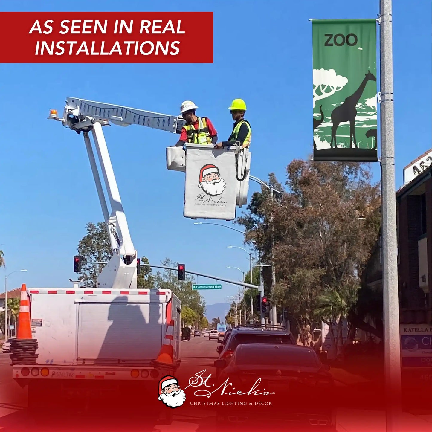 Zoo themed pole banner installed on street pole during real commercial installation