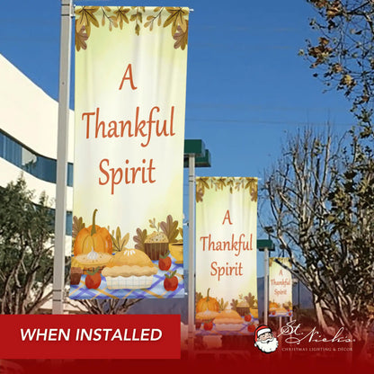 A Thankful Spirit Thanksgiving pole banner installed along city street for seasonal décor