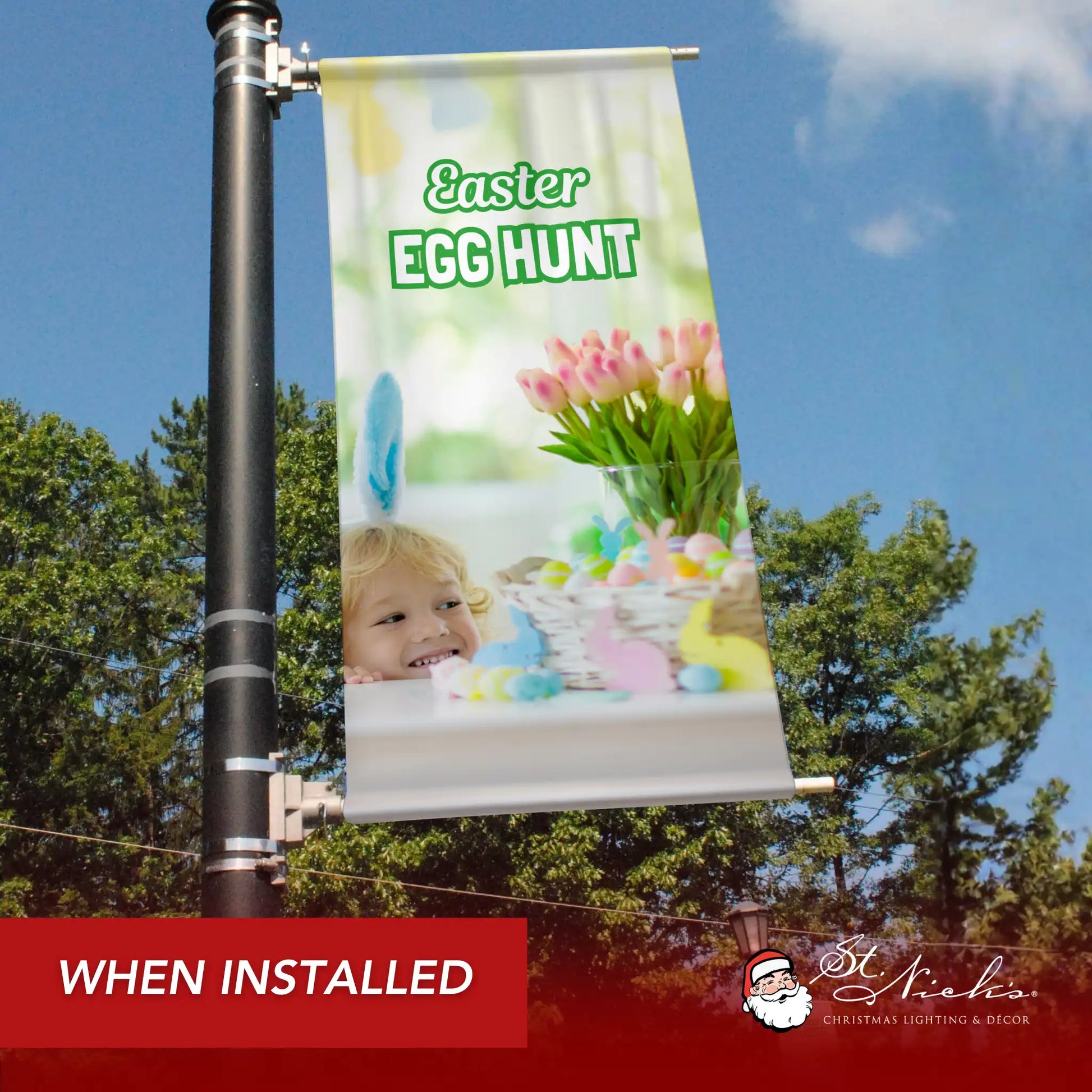 Easter Egg Hunt pole banner installed along city street promoting community Easter activities