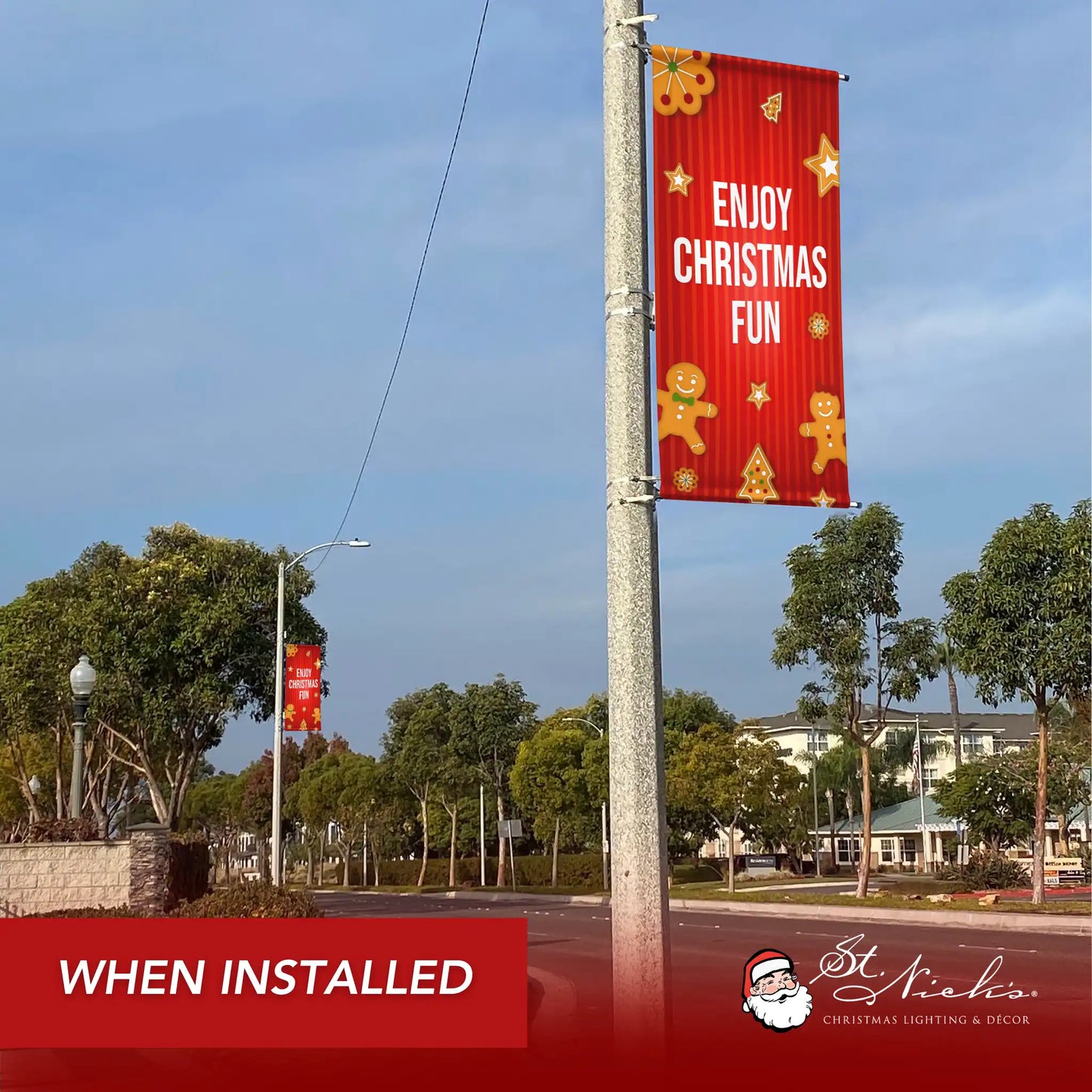 Enjoy Christmas Fun Christmas pole banner installed along city street for festive holiday décor