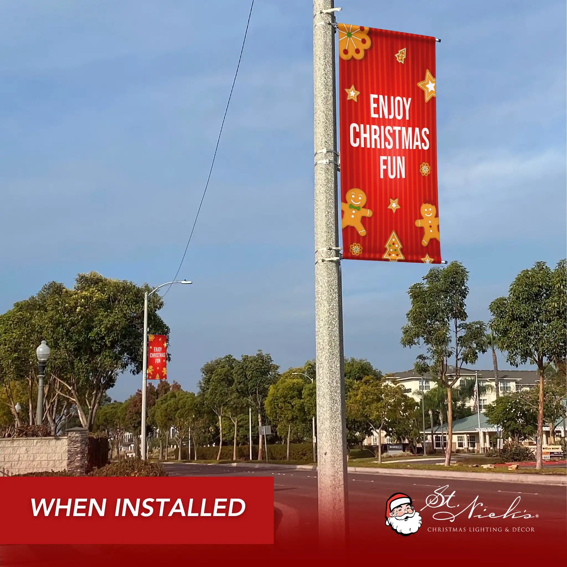 Enjoy Christmas Fun Christmas pole banner installed along city street for festive holiday décor