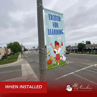 Excited for Learning school pole banner installed along city street for back-to-school décor