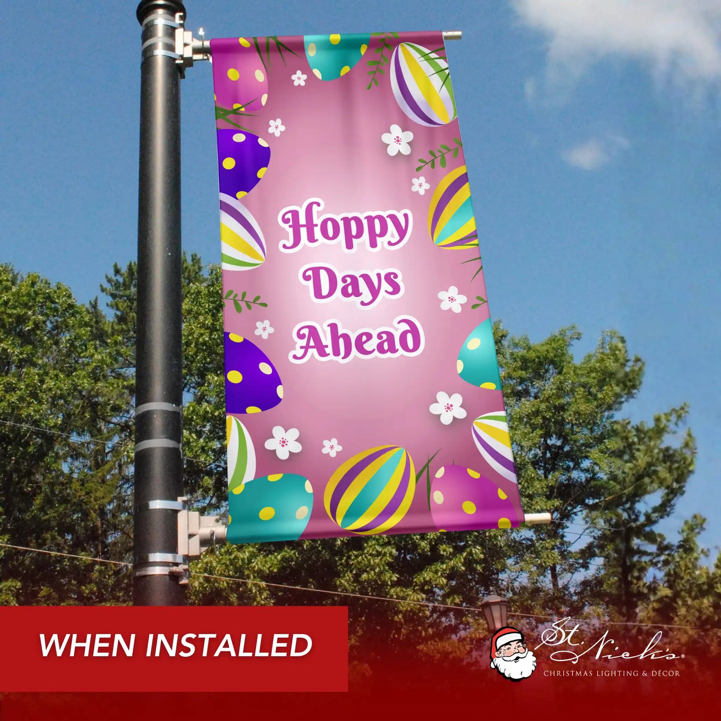 Hoppy Days Ahead Easter pole banner installed along city street for seasonal spring décor
