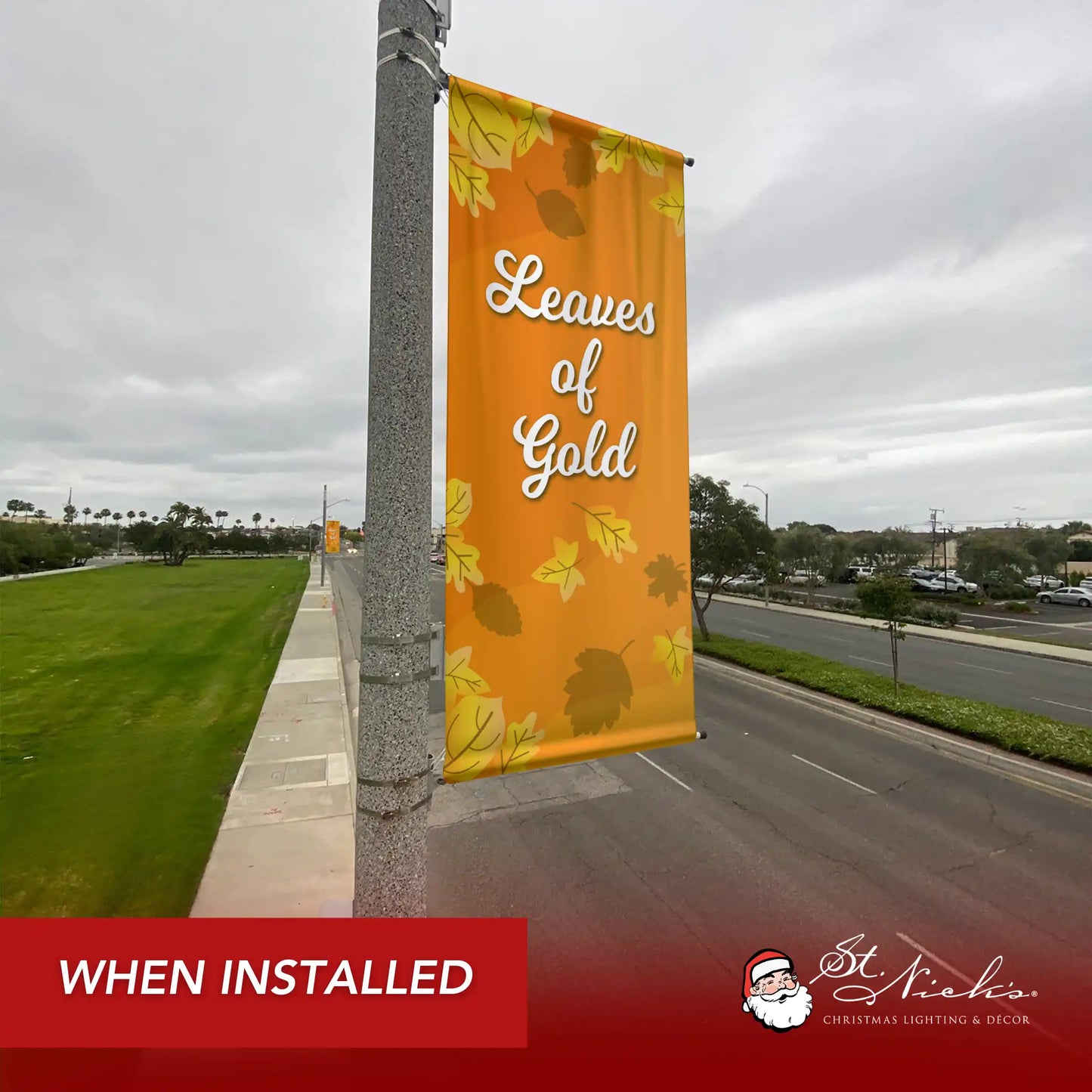 Leaves of Gold fall pole banner installed along city street for seasonal autumn décor