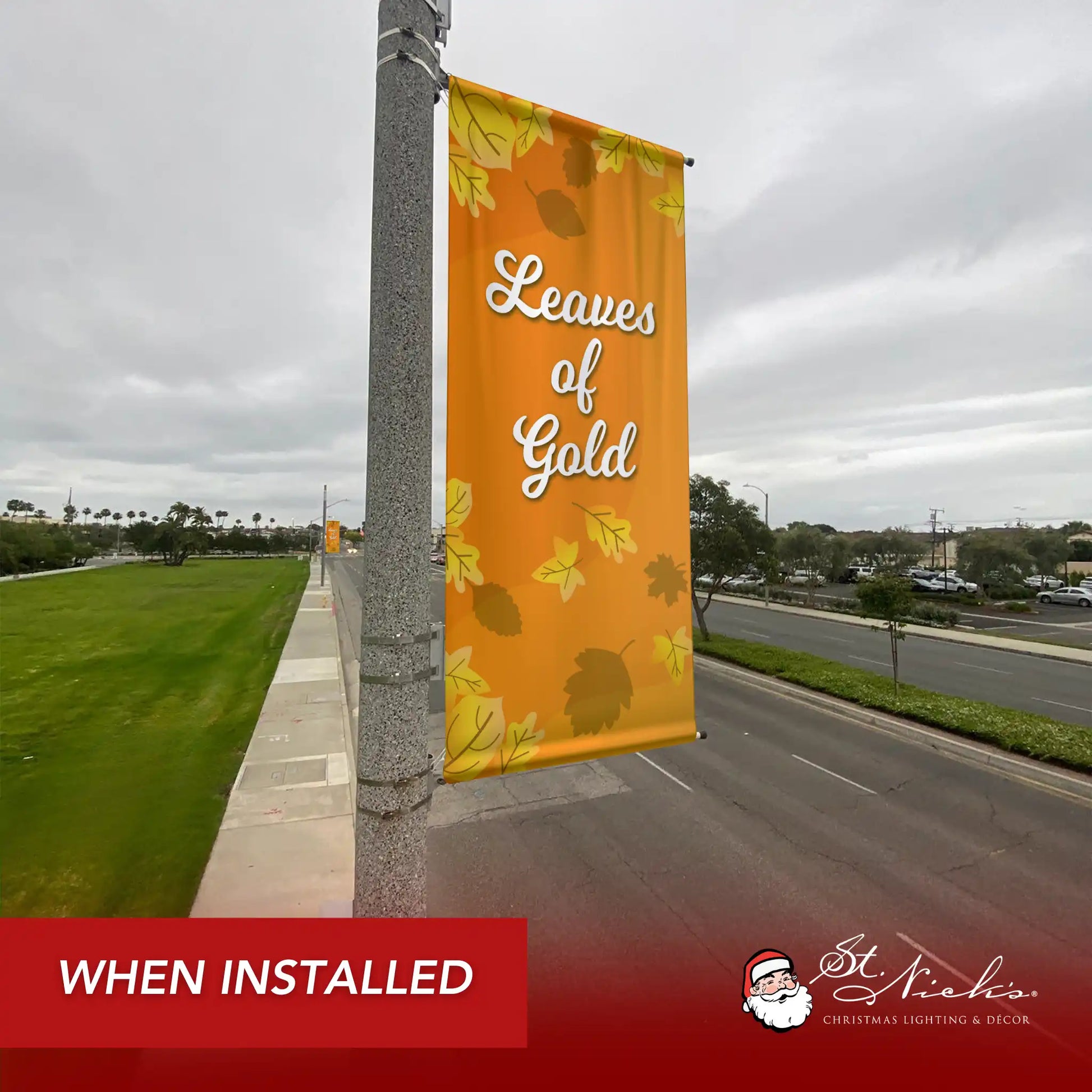 Leaves of Gold fall pole banner installed along city street for seasonal autumn décor